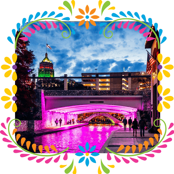 Congress-Venue-Downtown Photo of the San Antonio Riverwalk in a flower border